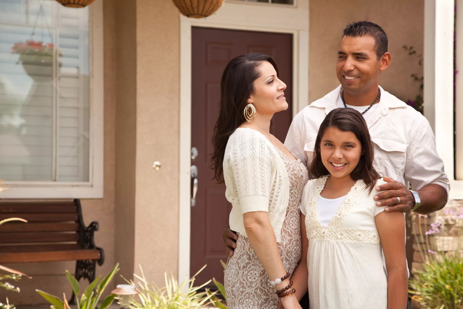 hispanic family in front of door