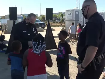 Police officers with children