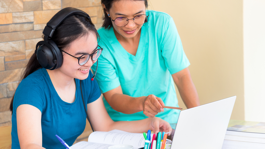 bigstock-Happy-Two-Asian-Woman-Mother-I-401381339.jpg Mother and daughter using laptop